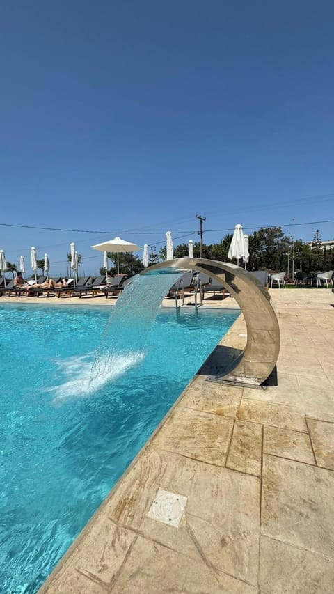 2 outdoor pools, pool umbrellas, sun loungers