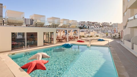 Indoor pool, outdoor pool, pool umbrellas, sun loungers