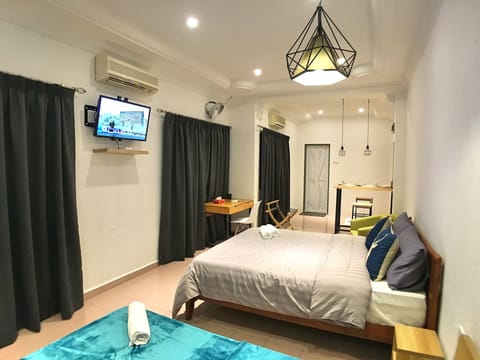 Deluxe House, 1 Bedroom | 1 bedroom, desk, blackout drapes, iron/ironing board