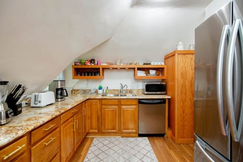 kitchen showing 3 door large refrigerator.