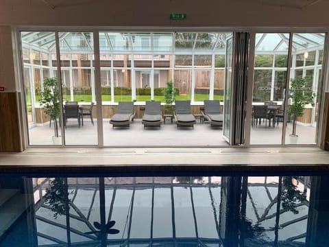 Indoor pool, open 7:00 AM to 8:00 PM, sun loungers
