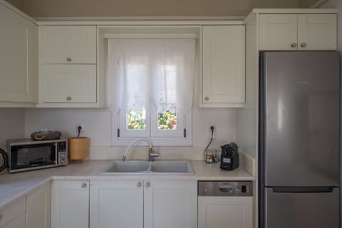 Villa, 4 Bedrooms, Sea View | 3 bedrooms, laptop workspace, iron/ironing board, free cribs/infant beds