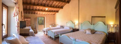 Family Room | Minibar, desk, iron/ironing board, free WiFi