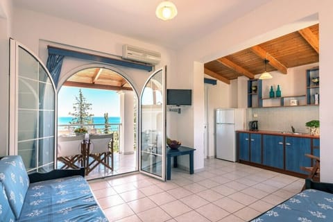 Apartment, Sea View | Private kitchen | Fridge, stovetop, electric kettle, cookware/dishes/utensils