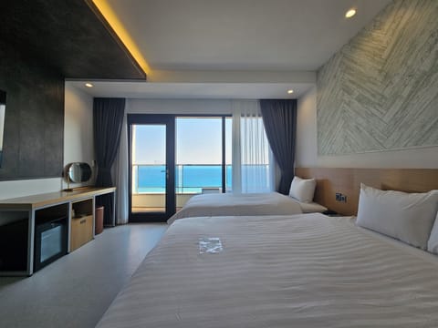 5. Deluxe Twin Ocean | Down comforters, blackout drapes, soundproofing, free WiFi
