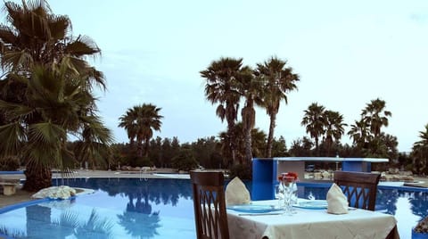Seasonal outdoor pool, open 9:00 AM to 6:30 PM, sun loungers