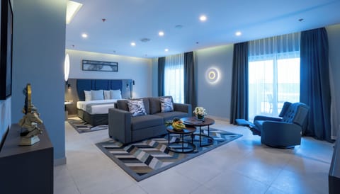 AL MAJAZ  TWO BEDROOM SUITES | Minibar, in-room safe, desk, blackout drapes