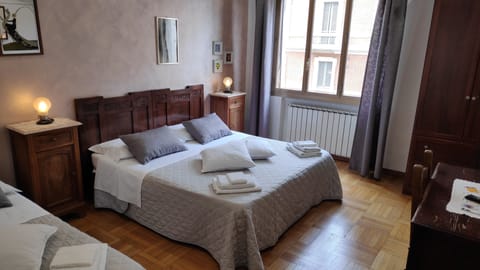 Triple Room, Private External Bathroom, City View ( Rovere ) | Minibar, blackout drapes, iron/ironing board, free WiFi