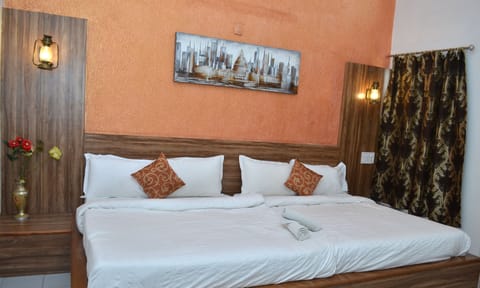 Family 4 Bed Non AC Room | Rollaway beds, bed sheets