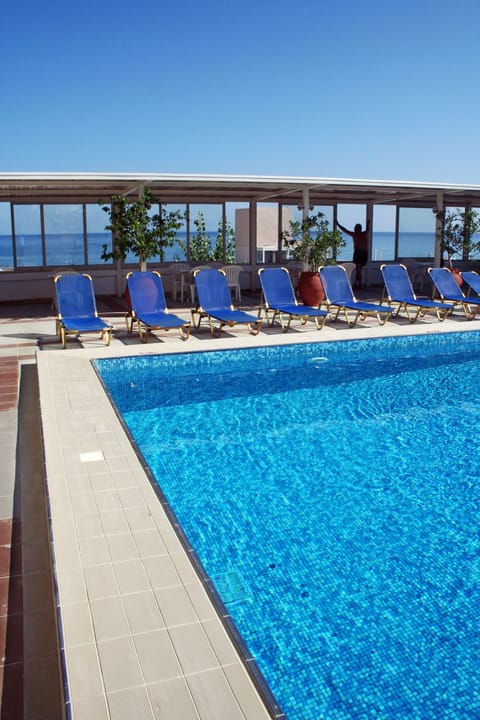 Seasonal outdoor pool, pool umbrellas, sun loungers
