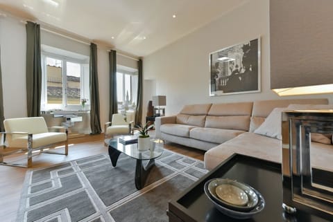 Apartment, 4 Bedrooms | Living room | Flat-screen TV
