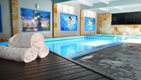 Indoor pool, sun loungers