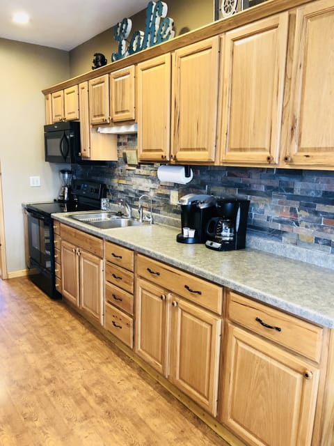 Natural hickory finish throughout kitchen