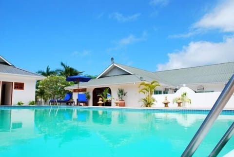 Outdoor pool, open 10 AM to 10 PM, sun loungers