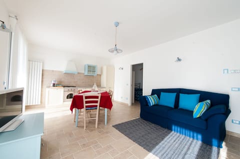 Apartment, 2 Bedrooms | Living area | Flat-screen TV