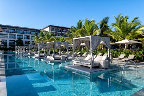 5 outdoor pools, open 7:00 AM to 6:00 PM, pool umbrellas, sun loungers
