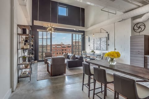 Arm Chairs, TV, Sofa, Breakfast Bar, Stools, and Dining Set with Bench.