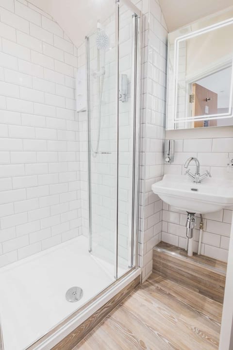 Shower, free toiletries, hair dryer, towels