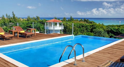Infinity rooftop pool with views of the Sea