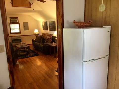 VIEW FROM KITCHEN LOOKING INTO LIVING ROOM