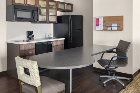 Desk, laptop workspace, blackout drapes, iron/ironing board