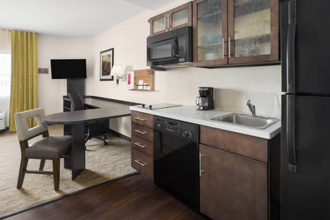 Desk, laptop workspace, blackout drapes, iron/ironing board