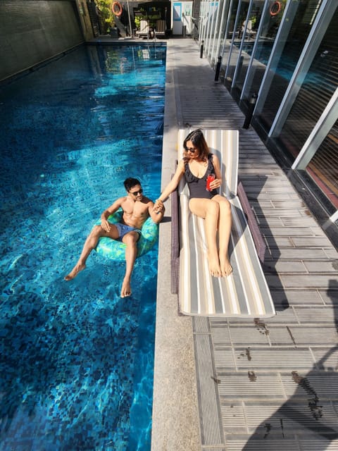 Outdoor pool, open 7:00 AM to 8:00 PM, pool umbrellas, sun loungers