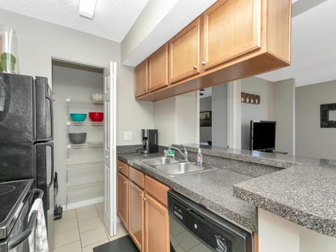 Modern kitchen with sleek appliances and extra storage