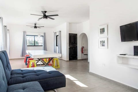 Living room with large table for dinners or working, electrical plugs and strong wifi