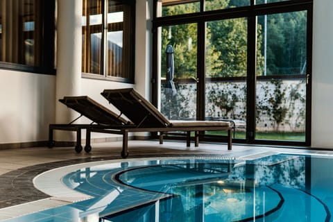 Indoor pool, sun loungers