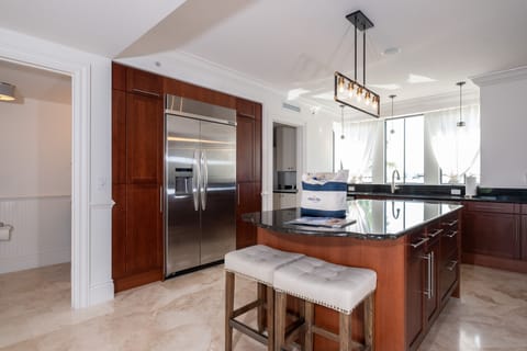 Residence #3826 - Spacious Kitchen with Center Island & Adjoining Half-Bathroom