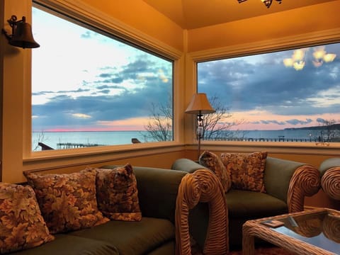 Sunroom off the kitchen and living room with a magnificent view of the Chesapeake Bay 