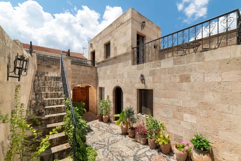 Wonderful spacious courtyard with stairs to Captains Suite and terrace