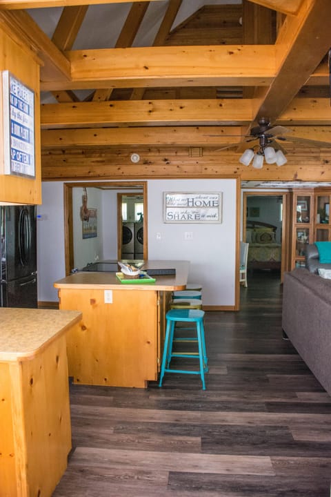 From the dining room looking out into the Great Room/ Kitchen.