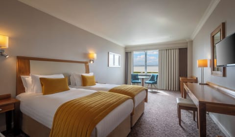 Deluxe Twin Room, Sea View | In-room safe, desk, blackout drapes, iron/ironing board