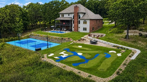 Complete w/ mini golf, pool, pickleball court, and firepit!