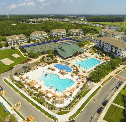 Sun Ridge Pool with Splash Park, two pools, hot tub, bar, cafe, tennis courts.