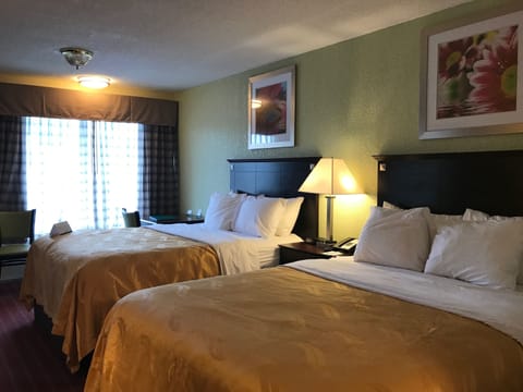 Standard Room, 2 Queen Beds, Non Smoking | In-room safe, iron/ironing board, free cribs/infant beds, rollaway beds