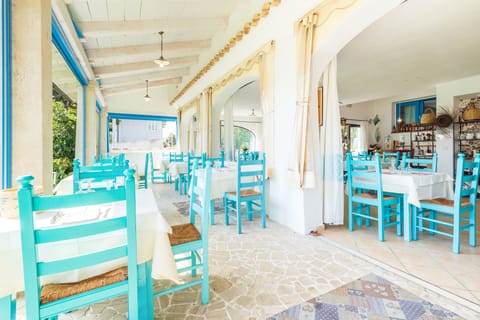 Dinner served, Mediterranean cuisine, garden views 