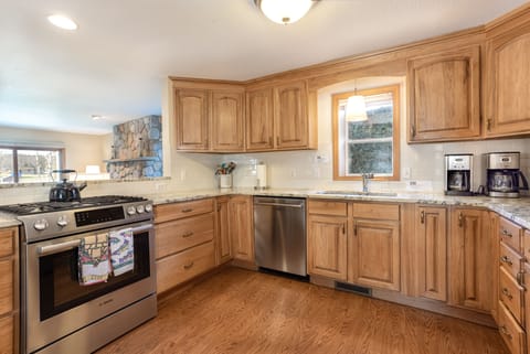 Kitchen opens to living and dining room for easy socializing