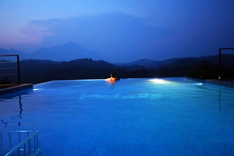 Outdoor pool, open 8 AM to 8 PM, pool umbrellas, sun loungers