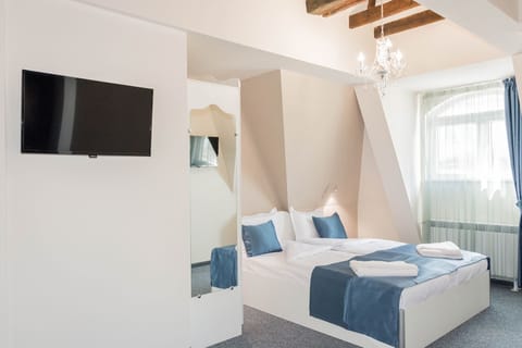 Apartment, 1 Bedroom, Sea View | Minibar, in-room safe, desk, laptop workspace