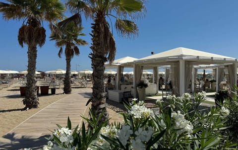 Private beach nearby, white sand, sun loungers, beach umbrellas