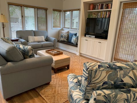 Living room with two doors to wrap around deck