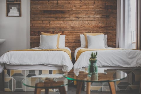 Standard Triple Room, 2 Twin Beds, Shared Bathroom | Individually decorated, individually furnished, blackout drapes