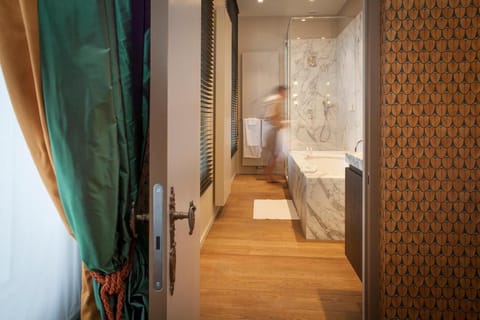 Suite, 1 King Bed (Thompson suite) | Minibar, in-room safe, individually decorated, individually furnished