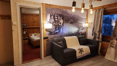 Superior Condo | Living area | Flat-screen TV