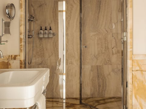 Deluxe Room | Bathroom | Designer toiletries, hair dryer, bathrobes, slippers