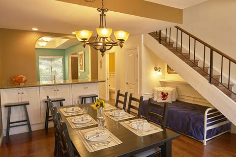 Trundle bed in understairs nook sleeps two comfortably. Half bath is steps away.