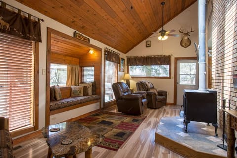 Log furnishings, ceiling fans, woodstove